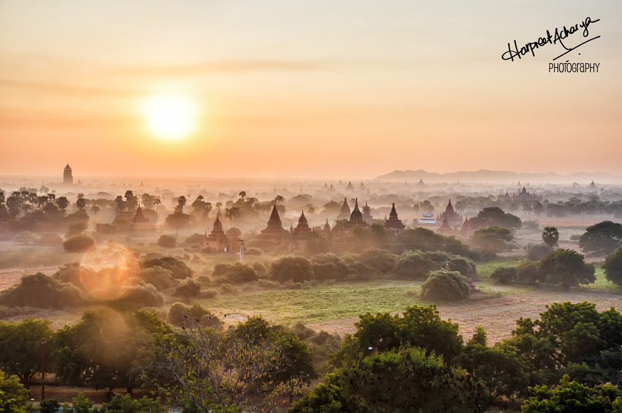 Dawn breaks over the plains, temple spires rising amidst swirling mist…