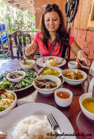 Yours truly – wondering which curry to dig in to at Feel Myanmar