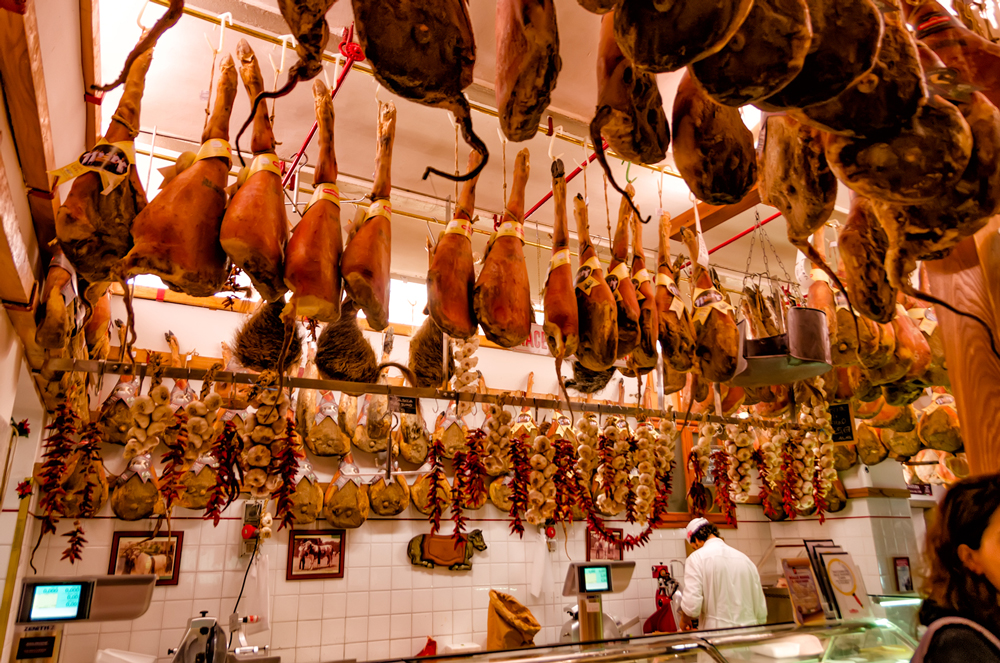 Typical Italian hams hung in Greve